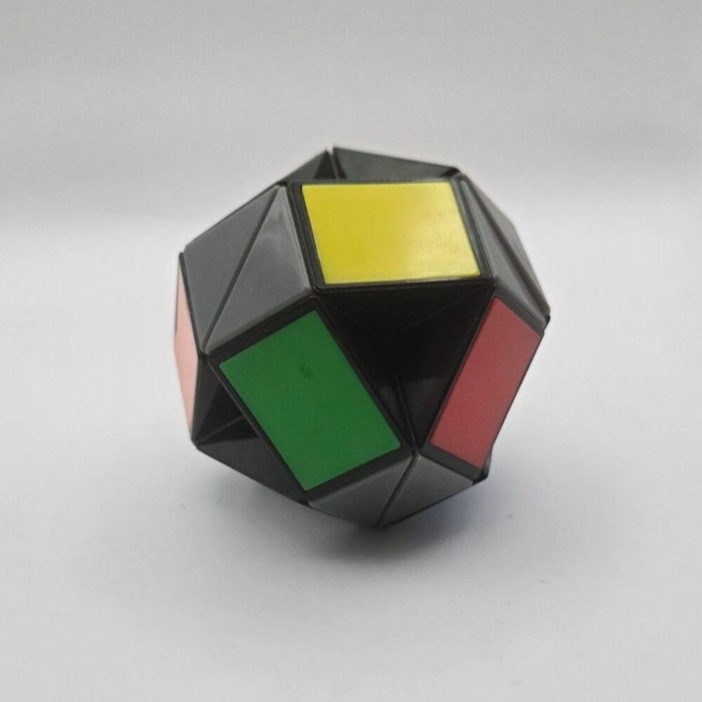 Vintage Official Rubiks Twist Snake Puzzle Convertible Ball Folding Toy